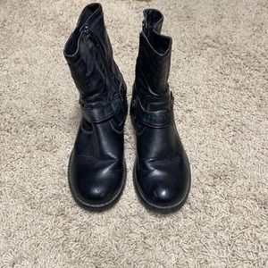 Gently used black buckle boots.